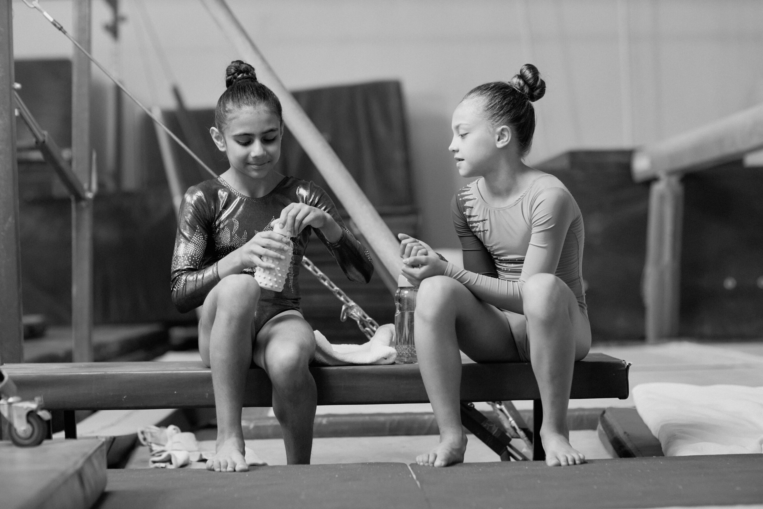 teenage-girl-gymnasts-resting-after-training-2025-03-06-05-52-24-utc